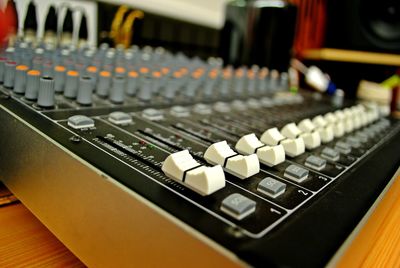 Close-up of sound mixer at recording studio