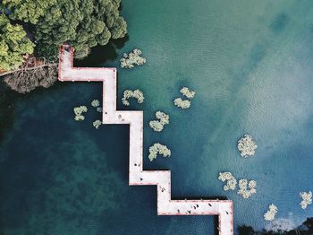 High angle view of swimming pool by lake