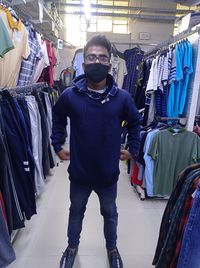 Full length of man standing at store