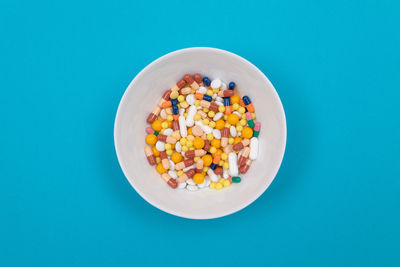 High angle view of breakfast on table against blue background