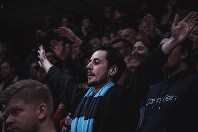 Group of people looking at music concert