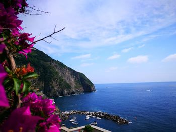 Scenic view of sea against cloudy sky