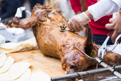 Close-up of person preparing food