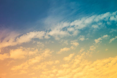 Low angle view of cloudy sky during sunset