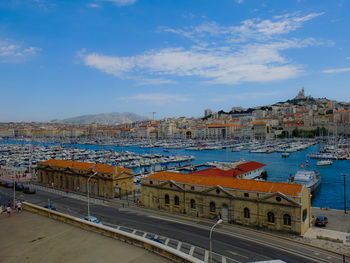 View of buildings against blue sky