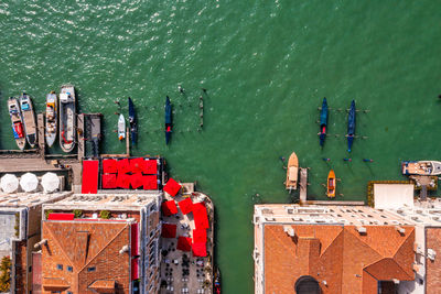 Top down view of moored empty venetian gondolas