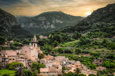 High angle view of townscape against sky during sunset