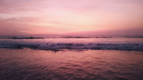 Scenic view of sea at sunset