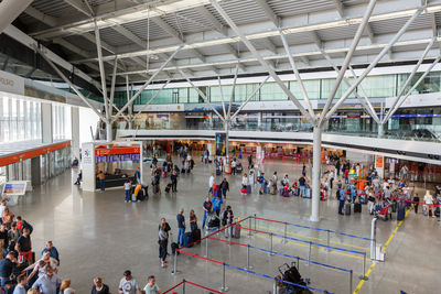 High angle view of people walking on airport