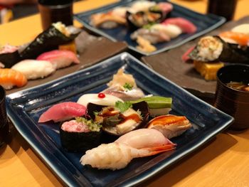 Close-up of sushi in tray on table