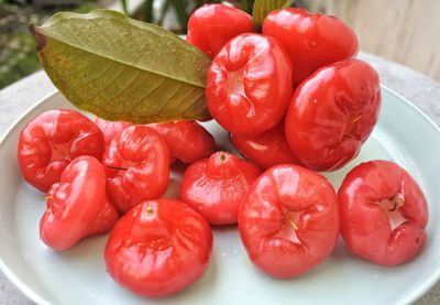 High angle view of strawberries in plate