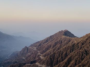 Scenic view of mountains against sky during sunset