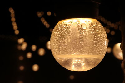 Close-up of illuminated light bulb