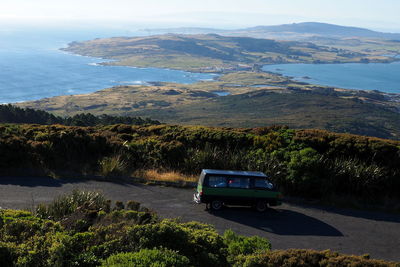 High angle view of road by sea against sky