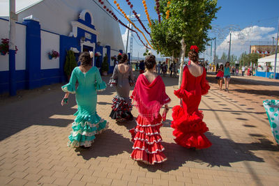 People walking on street in city