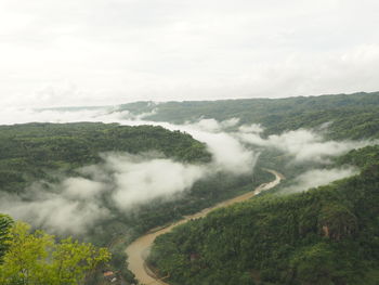 Aerial view of agricultural landscape against sky