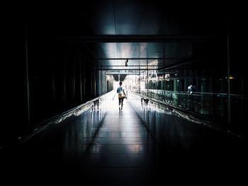 People walking on bridge