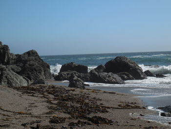 Scenic view of sea against clear sky