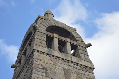 Low angle view of historic building against sky