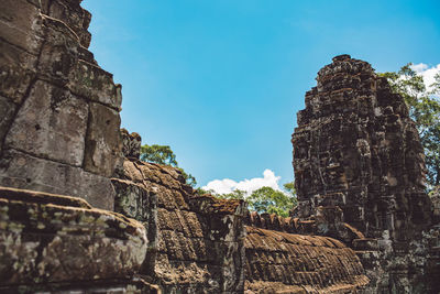 Low angle view of old ruin building against sky