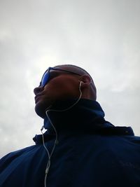 Low angle view of man against sky