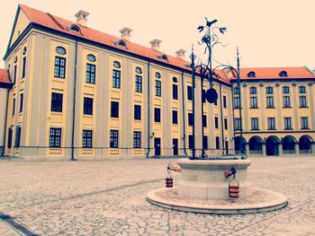 Buildings in city against sky