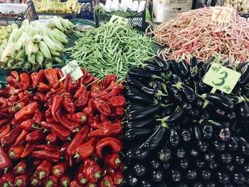 Red chili peppers for sale at market stall
