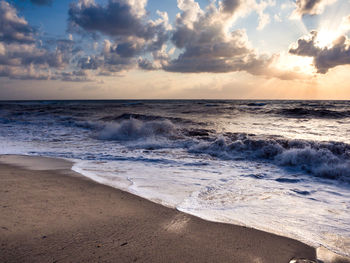 Scenic view of sea against sky during sunset