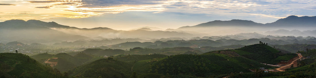 Panoramic view of mountains against sky during sunset