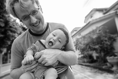 Portrait of father with son