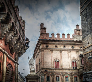 Low angle view of old building against sky