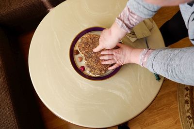 High angle view of woman preparing food