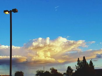 View of street light against cloudy sky