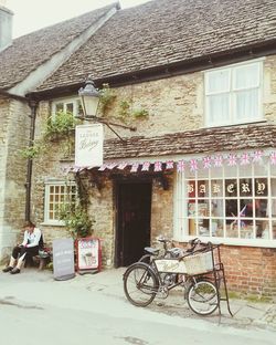 Bicycle against house
