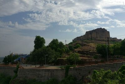 View of old ruin building against cloudy sky