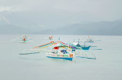 Boats in calm sea
