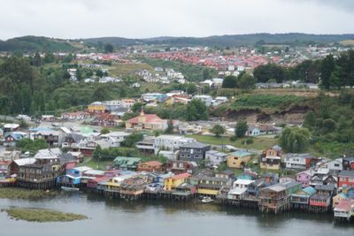 High angle view of townscape by river