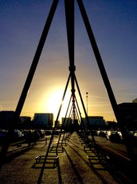 Silhouette of bridge against sky during sunset