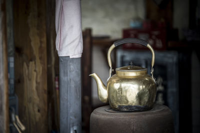 Close-up of kettle on table