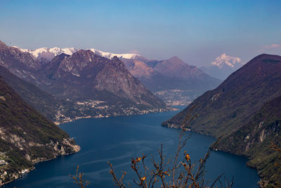High angle view of lake with mountain range in background