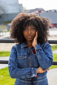 Portrait of young woman looking away