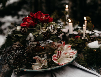 Close-up of red flowers on table