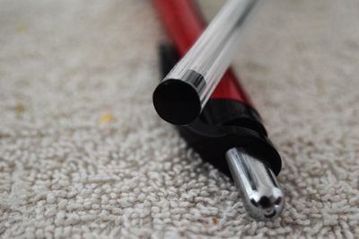 Close-up of fountain pens on rug