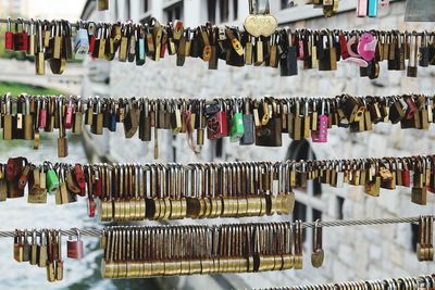 Padlocks hanging in market for sale