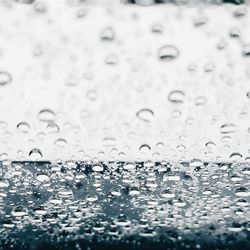 Close-up of water drops on glass