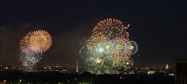 Firework display at night