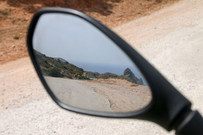 Close-up of side-view mirror