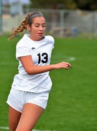 Beautiful young woman with ball