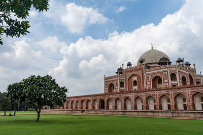 View of historical building against cloudy sky