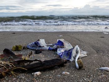 Garbage on sand at beach